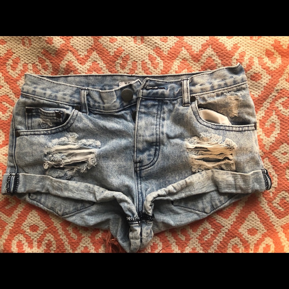 Distressed denim shorts